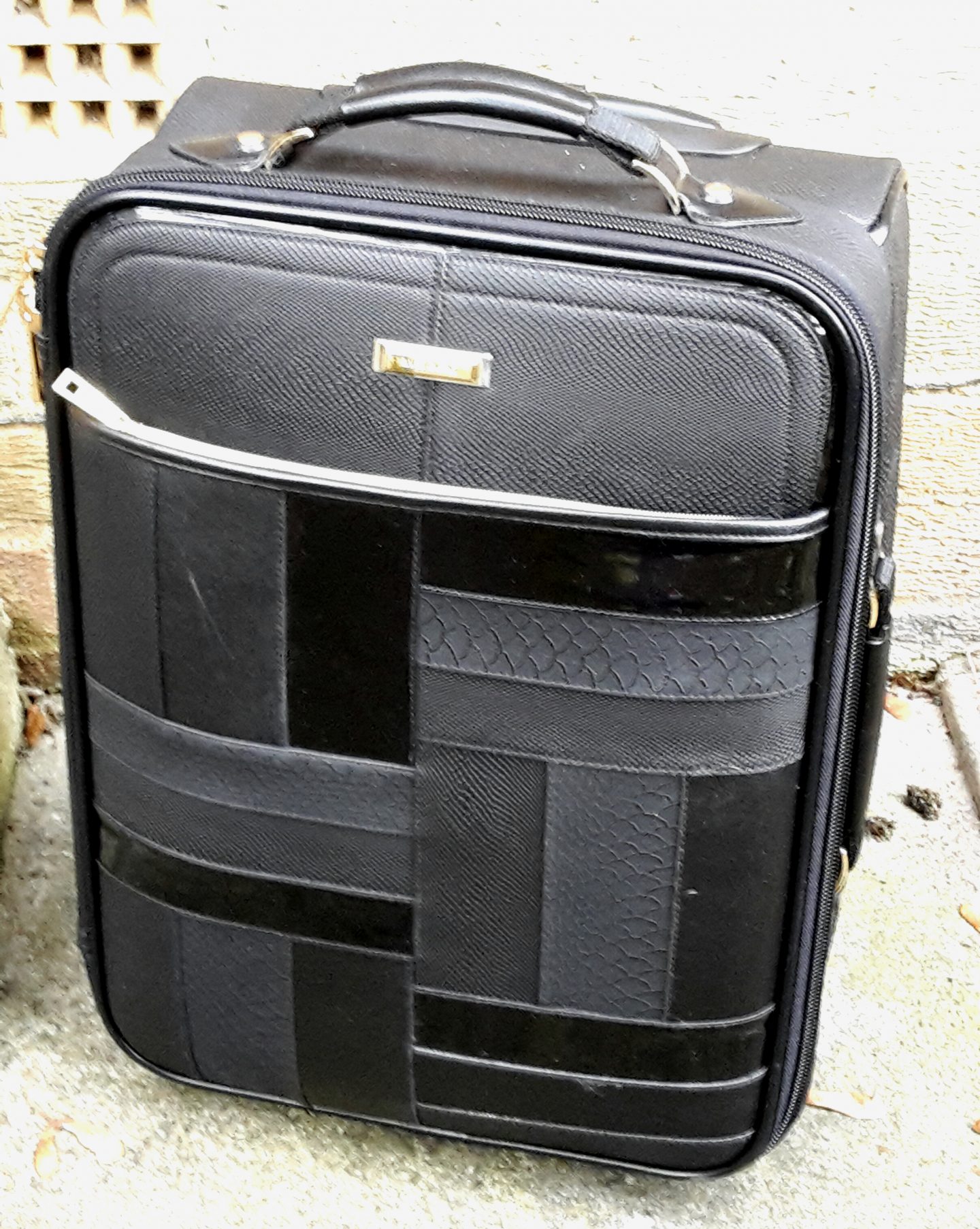 black patent suitcase